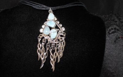 Modern design sterling silver, larimar pendant  on cotton cord adaptable to chain or omega. SOLD